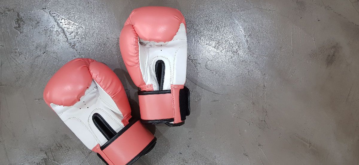 boxing gloves on concrete floor